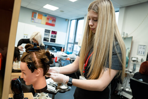 A hairdressing student