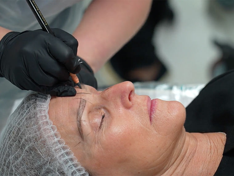 A client having a microblading treatment at the salon